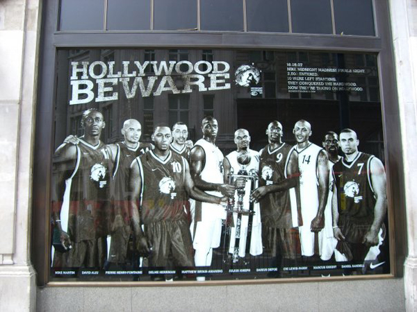 The shop window of Nike Town, London. 2007 Midnight Madness Winners en-route to Hollywood